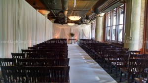 Elegant Event Lighting transforms Ceremony Space  at River Roast for Sabrina & Scott's Wedding.