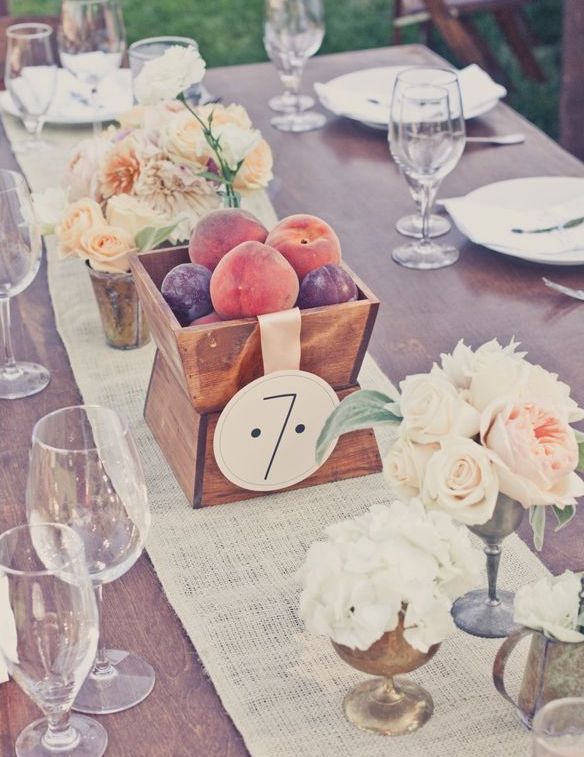 bowls of fruit and flowers